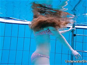 magnificent gal demonstrates magnificent assets underwater