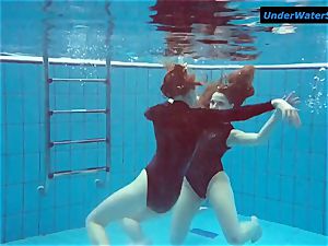 2 warm teens underwater